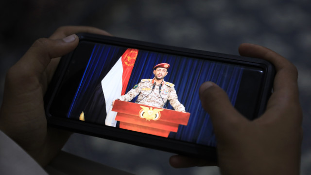 The Houthis` military spokesman Yahya Sarea delivering a TV statement after the Houthis seized an Israeli ship in Red Sea, in Sana`a, Yemen, 19 November 2023